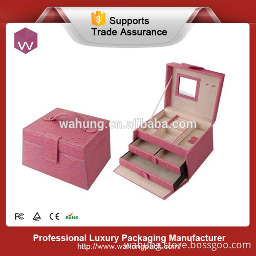 Pink leather display for jewelry box with drawer